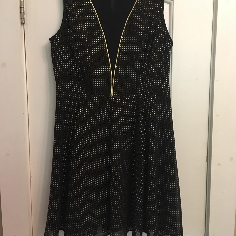 Black dress with metallic gold accents